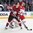 COLOGNE, GERMANY - MAY 6: Latvia's Miks Indrasis #70 battles for position with Denmark's Oliver Lauridsen #25 during preliminary round action at the 2017 IIHF Ice Hockey World Championship. (Photo by Andre Ringuette/HHOF-IIHF Images)

